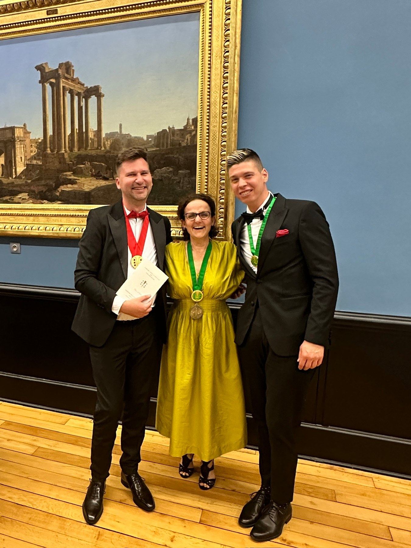 János Kopasz and Máté Hajdu with a fellow Chevalier of the Ordre des Coteaux de Champagne